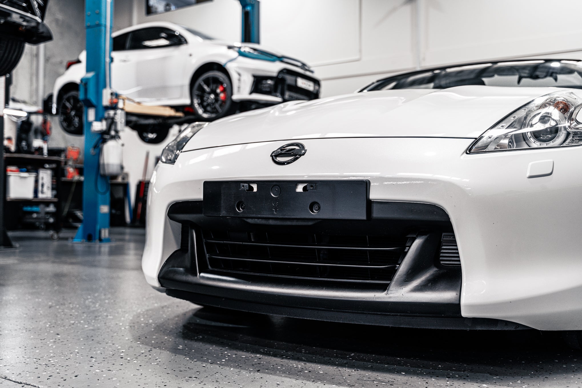 Nissan 370Z Z34 PFL 2009-2012 - OEM Plinth Delete Kit (FRONT)