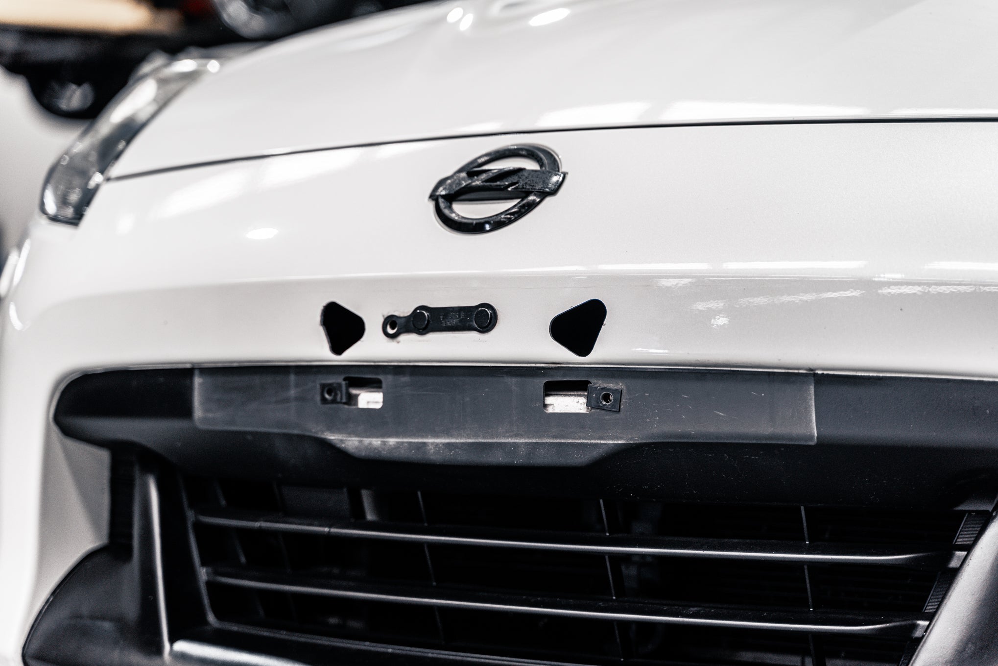 Nissan 370Z Z34 PFL 2009-2012 - OEM Plinth Delete Kit (FRONT)
