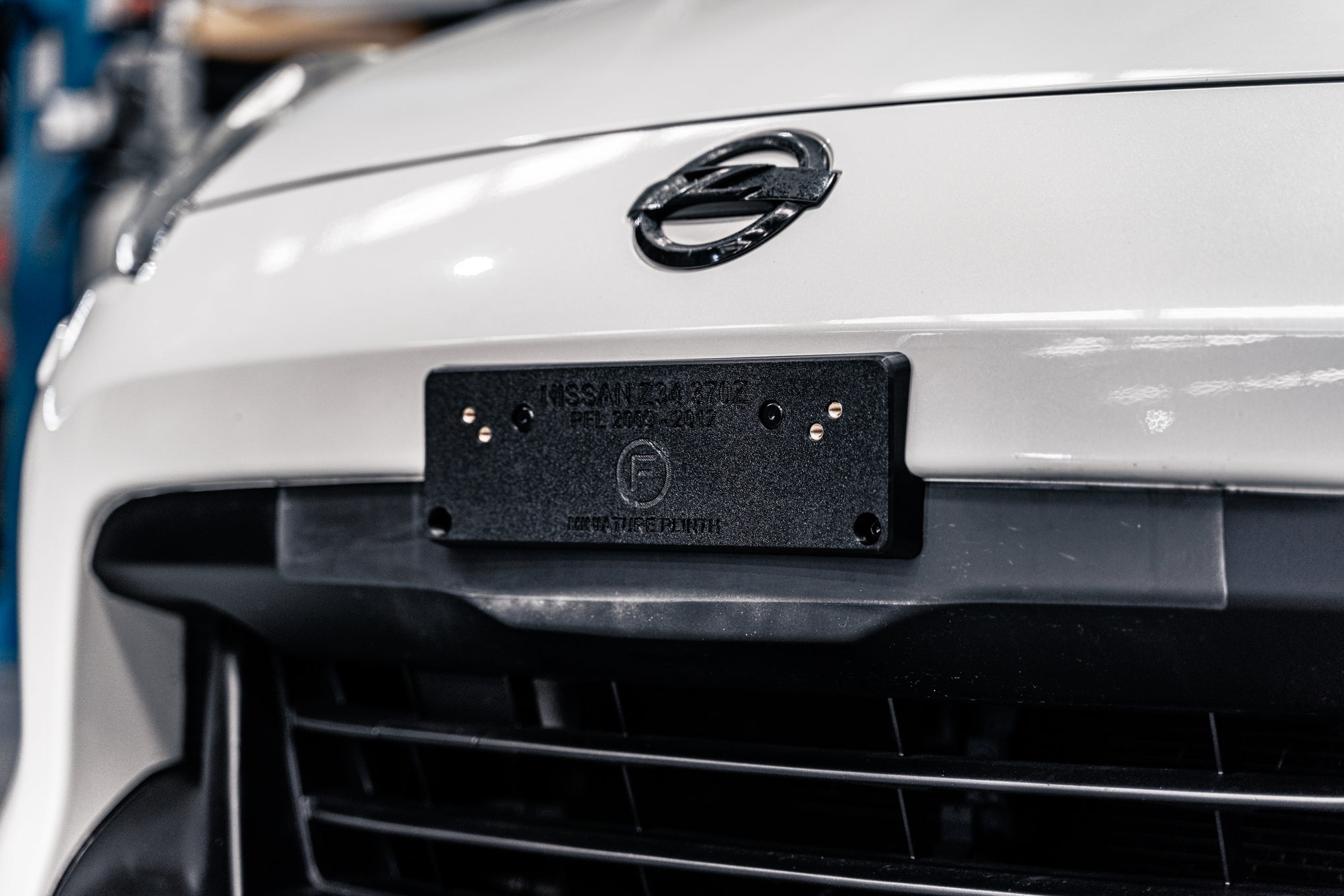 Nissan 370Z Z34 PFL 2009-2012 - OEM Plinth Delete Kit (FRONT)